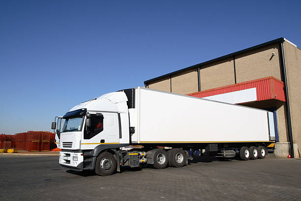 Long haul truck at loading dock for pick-up or delivery