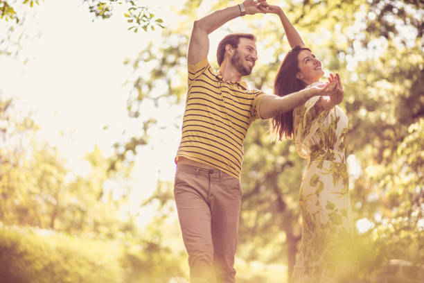 istock Smiling happy couple at spring season. 954914922