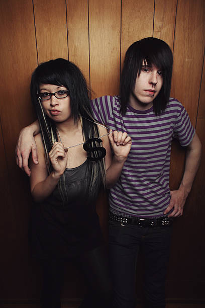 istock boy and girl with money necklace 95491649