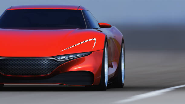 istock red car driving on a road 954918450