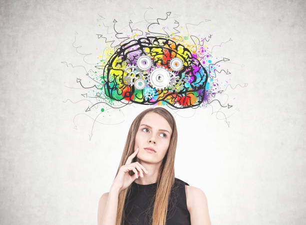istock Pensive blonde woman, cog brain 954919752