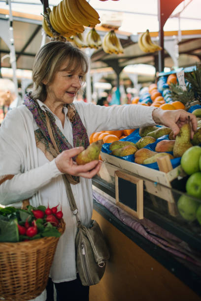 istock Senior Woman Grocery Shopping 954919954