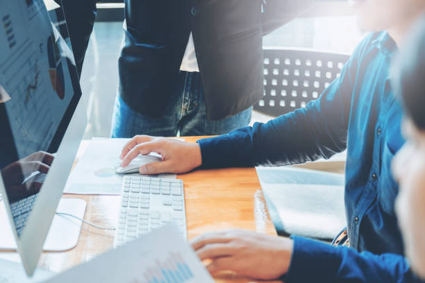 istock Startup business team colleagues meeting Planning Strategy Analysis discussing new plan financial on graph data new business project 954923076