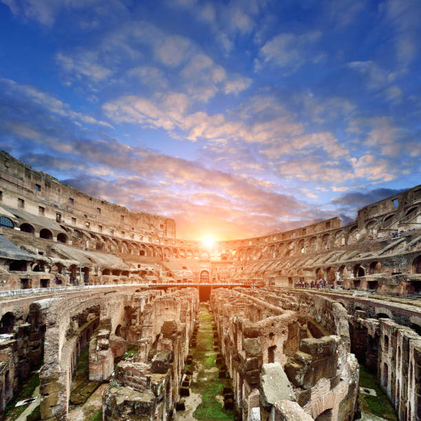 Coliseum at Sunset, Rome, Italy Coliseum at sunset in dramatic sky, Rome, Italy. inside the colosseum stock pictures, royalty-free photos & images