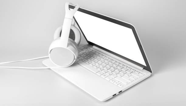 laptop and headphone isolated on white