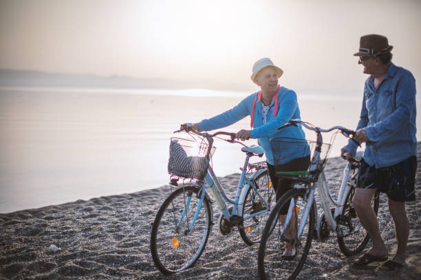 istock Active seniors couple with bike 954923950