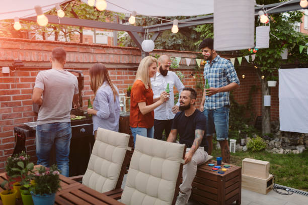 istock Friends having BBQ Party In Backyard 954924140