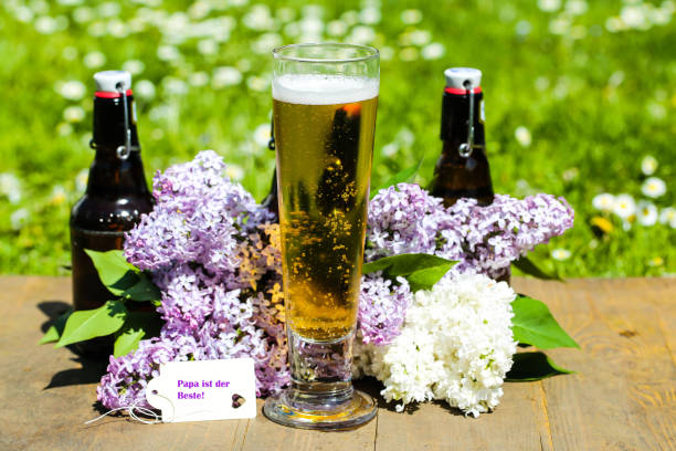 Beer glass on a restaurant table. Selective focus.\u2028http://www.massimomerlini.it/is/food.jpg
