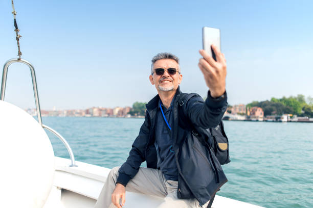 istock A tourist on a deck of a ferry 954927172