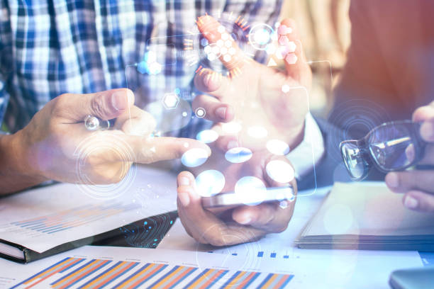 istock Businessman holding in hand tablet with global connection concept 954927924