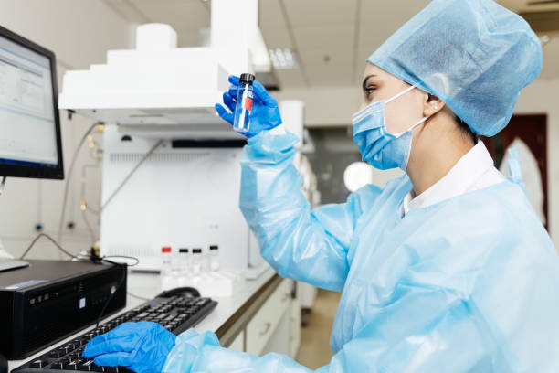 istock Young female scientist in laboratory, research, technology 954928896