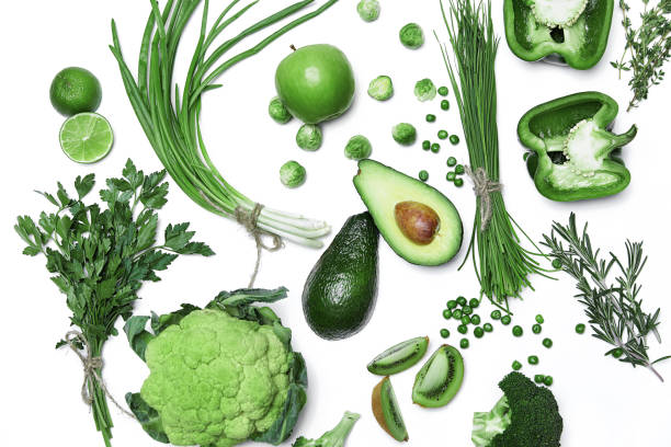 istock Fresh Green Vegetables And Fruits On White Background. 954929054