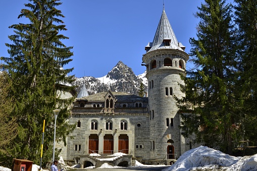 Gressoney-Saint-Jean, Valle d'Aosta region, Italy. 25 April 2018. Castel Savoia, is a villa built in the late 1800s in eclectic style. In a fairytale context, photos of the exterior. Sunny day.