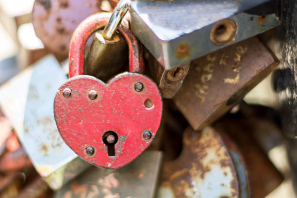 istock Rusty Heart. Hinged Lock in the Shape of the Heart 954931668