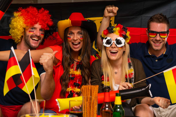 istock soccer fans cheering for germany 954936986