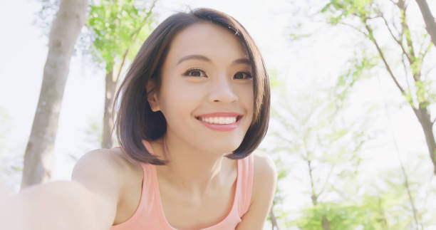 istock sport woman selfie happily 954937016
