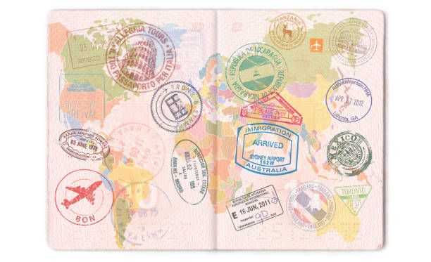 Visas, stamps, seals in the passport. World map, travel Visas, stamps, seals in the passport. World map, travel. arrival departure board photos stock pictures, royalty-free photos & images