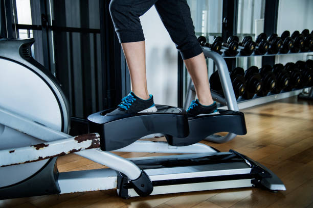 istock Woman working out at the gym 954937052