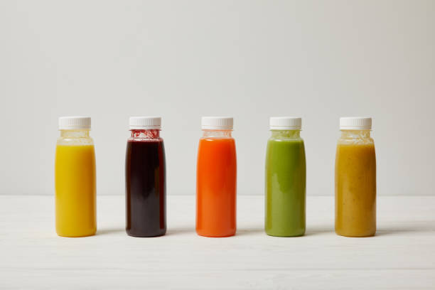 istock detox smoothies in bottles standing in row, refresh concept 954937180