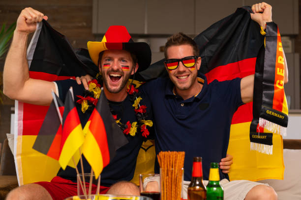 istock two german soccer fans 954937336