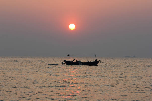 istock Sunrise and sunset on the sea and boat. 954940326