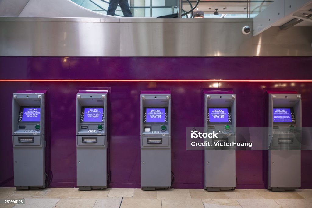 Free cash withdrawals ATM machines Row of free cash withdrawals ATM machines ATM Stock Photo