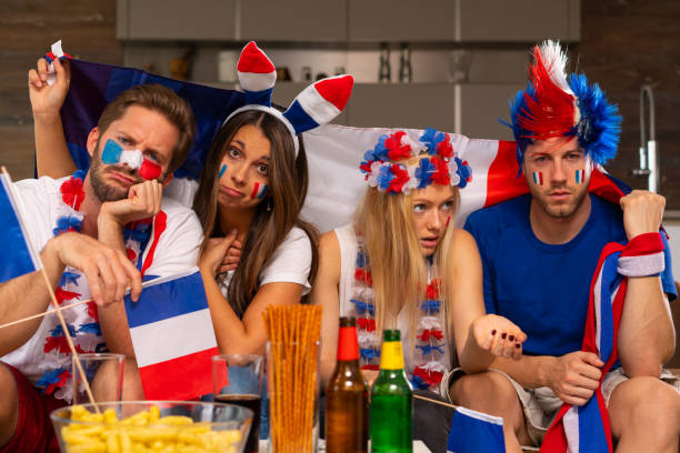 istock french/russian fans being disappointed 954947246