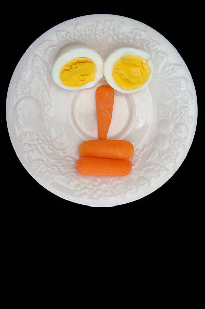 Eggs and Carrots stock photo