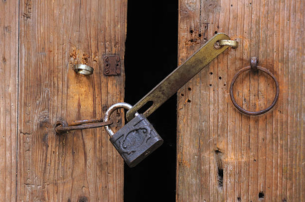 istock Padlock and wooden door 95495625