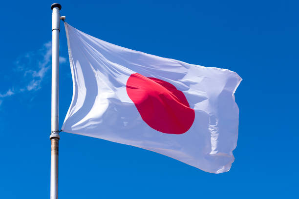istock Flag of Japan against blue sky 954966786