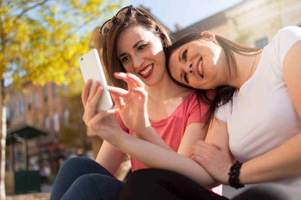 istock girls having fun at summer 954966904