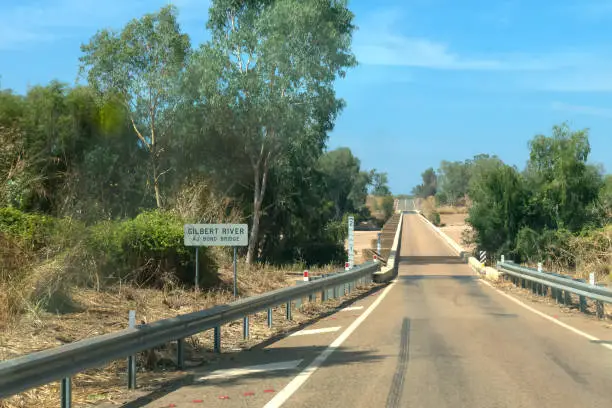 Photo of Low bridge over the dry Gilbert River in the outback of Queensland in Australia