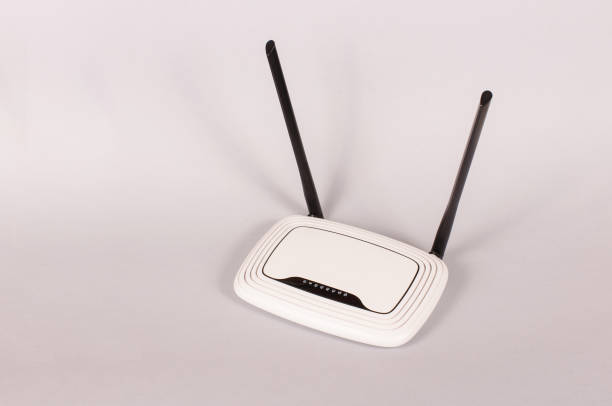 istock Wi-Fi router isolated on the gray background 954980154