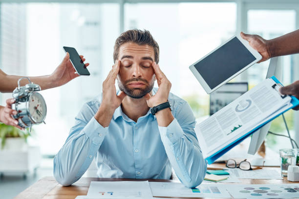 istock Drowning in the demands of a busy workday 954984488