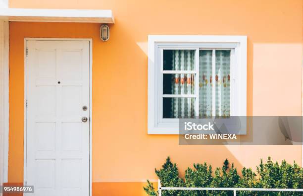 Front Of Resort With Door And Window On Green Background Stock Photo - Download Image Now