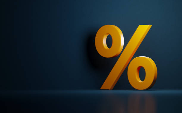 istock Yellow Percentage Symbol On Dark Blue Background 954987610