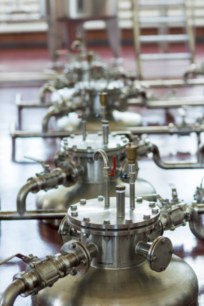 istock Copper still alembic inside distillery to distill grapes and produce spirits 954988720