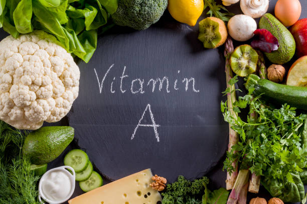 istock Green vegetables rich in vitamin A on black slate. 954997850