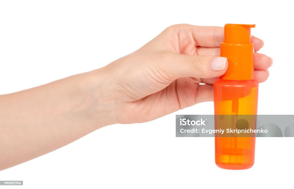 Bottiglia Arancione Cosmetica Con Dispenser Nel Corpo Dei Capelli