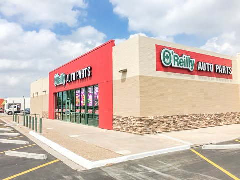 Irving, Tx: Facade entrance of O’Reilly Auto Parts store cloud blue sky. An American retailer provides automotive aftermarket parts, tools, supplies, equipment, and accessories