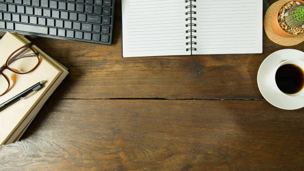 istock Business person working on wood table Flat lay background. 955003758