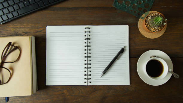 istock Business person working on wood table Flat lay background. 955003802