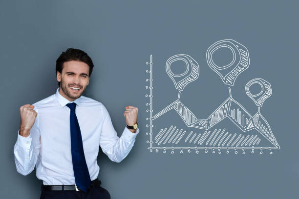 istock Happy manager smiling and feeling impressed by his success 955009696