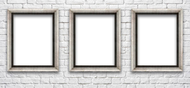 istock white brick wall with a frame to insert pictures and text 955009848