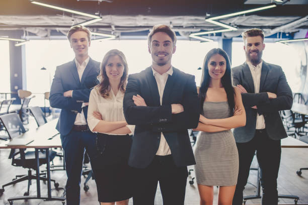 istock Group of people working in modern office 955010400