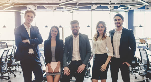 istock Group of people working in modern office 955010420