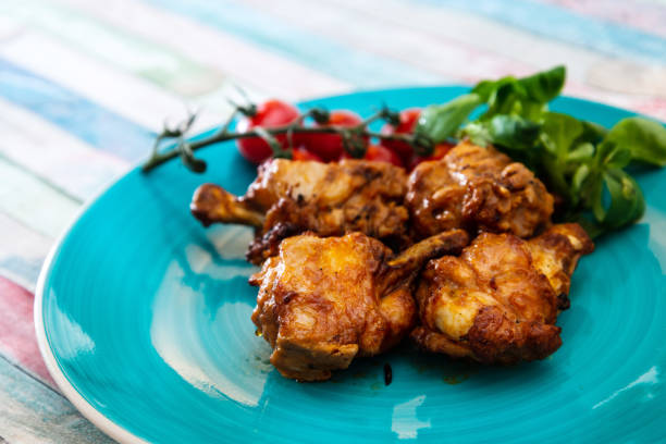 istock roasted sleeves chicken with potatoes and barbecue sauce 955040526