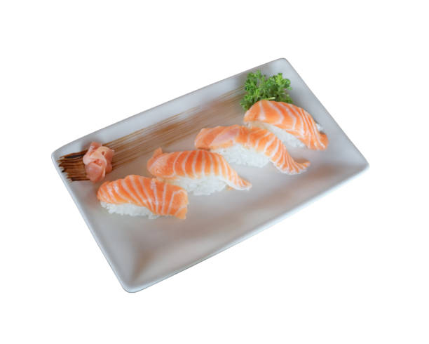 istock Raw salmon nigiri sushi dish isolated on white background with clipping path. 955045940