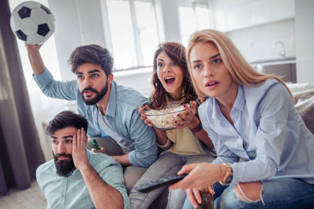 istock Friends having fun together at home 955046888