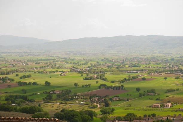istock View with mist from the Assisi city 955057856